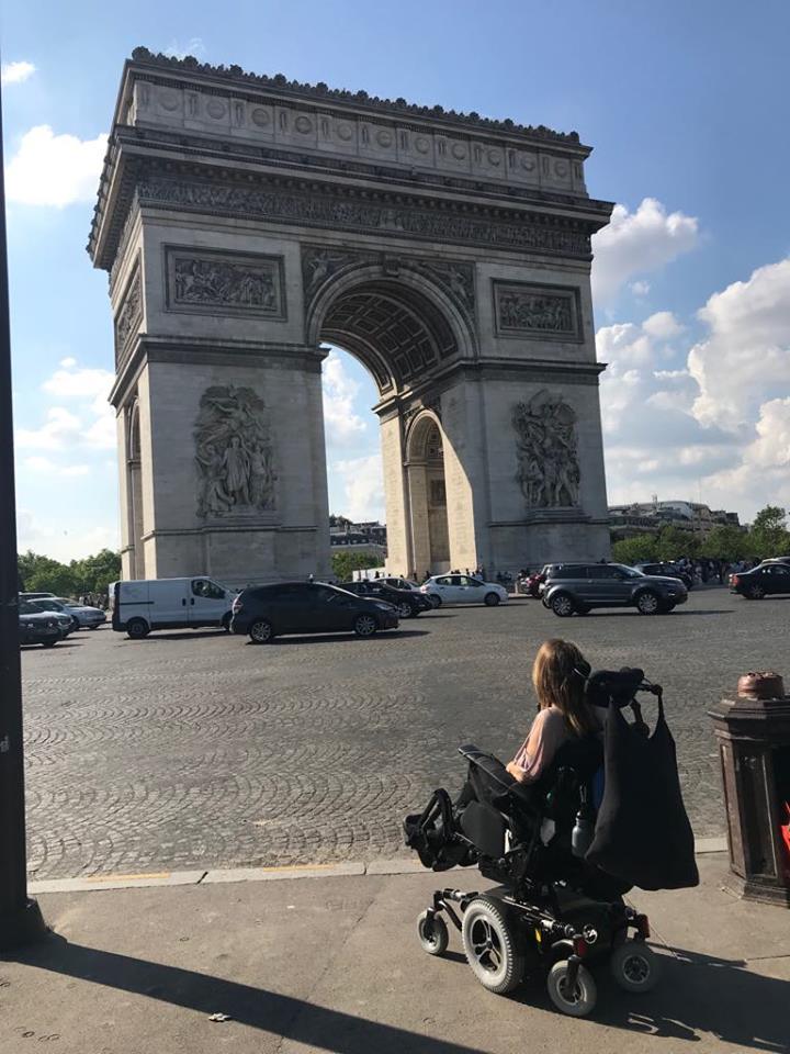 kylee_crossing_over_to_the_arc_de_triomphe.jpg
